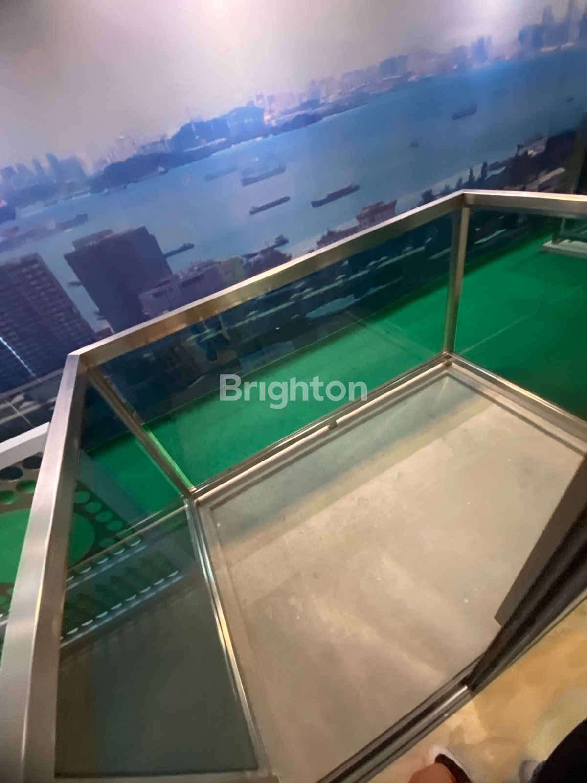 Glass-railed balcony of Nagoya Hill Condominium unit Batam