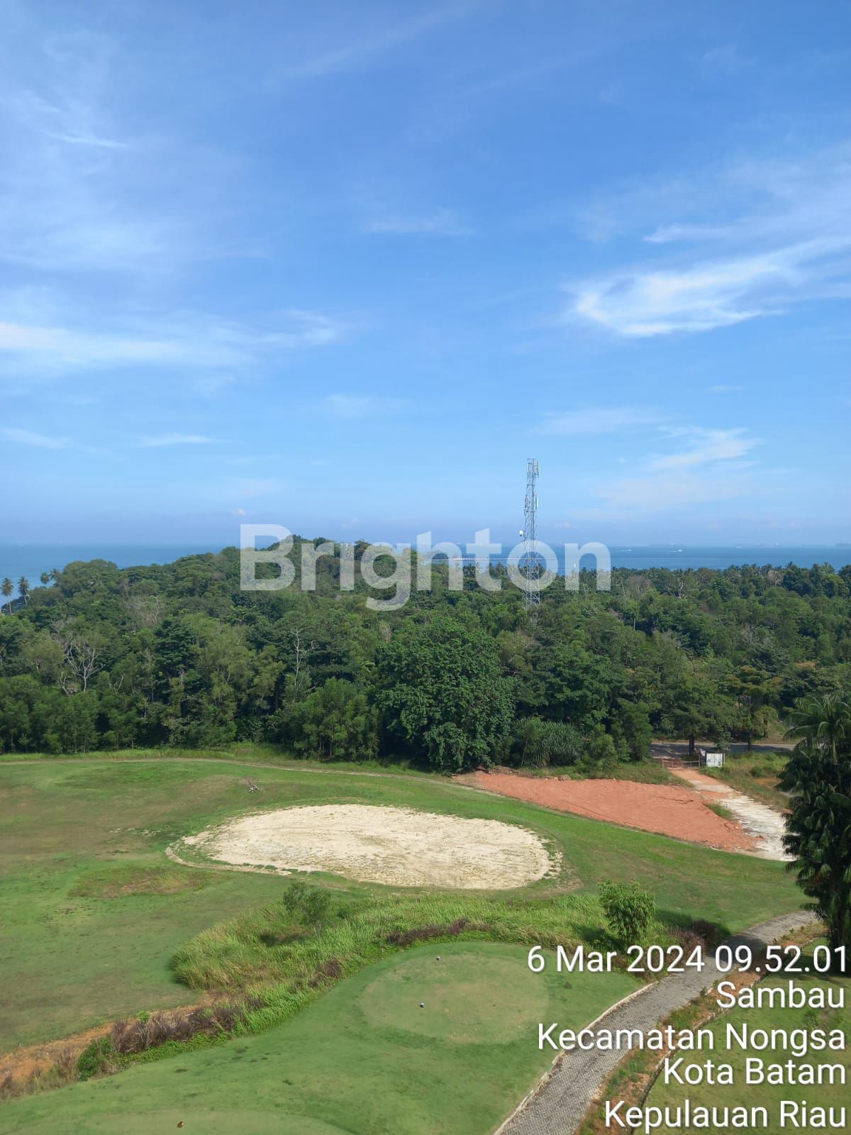 Pemandangan area hijau Nongsa dari apartemen Nuvasa Bay Batam