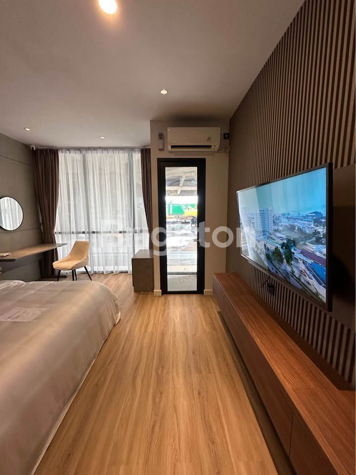Dapur dan area makan apartemen studio Tamarama Batam
