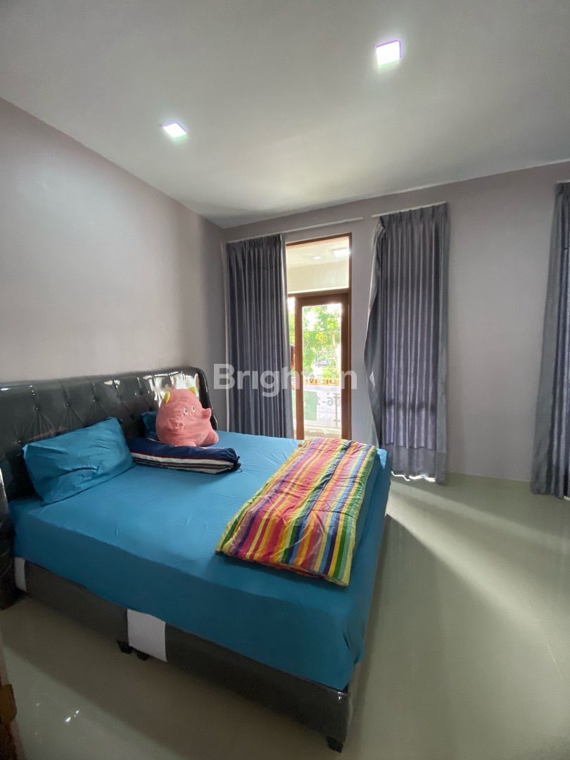 Master bedroom opening to the garden, Taman Golf Residence, Batam