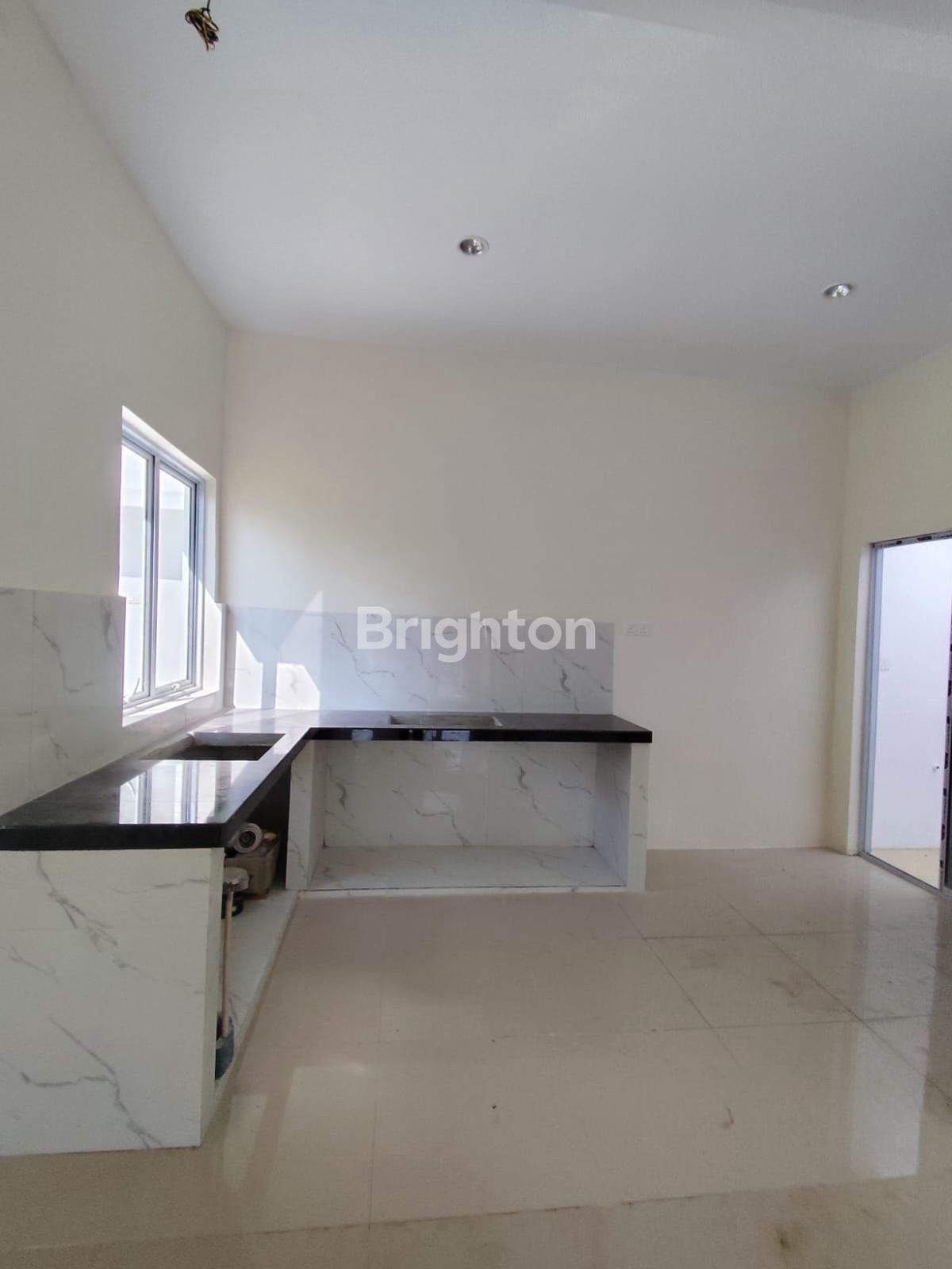 Halaman belakang rumah tipe 48/84 Cemara Park Batam
