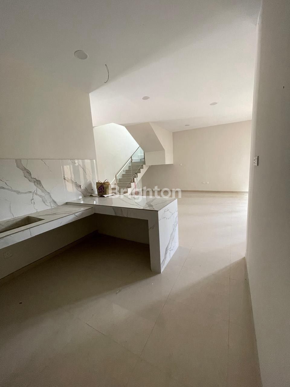 Area dapur rumah renovasi The Home at Southlinks Batam