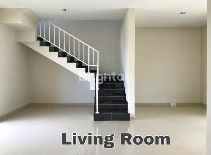 Ruang tamu dan tangga rumah baru Southlink Tiban Indah Batam